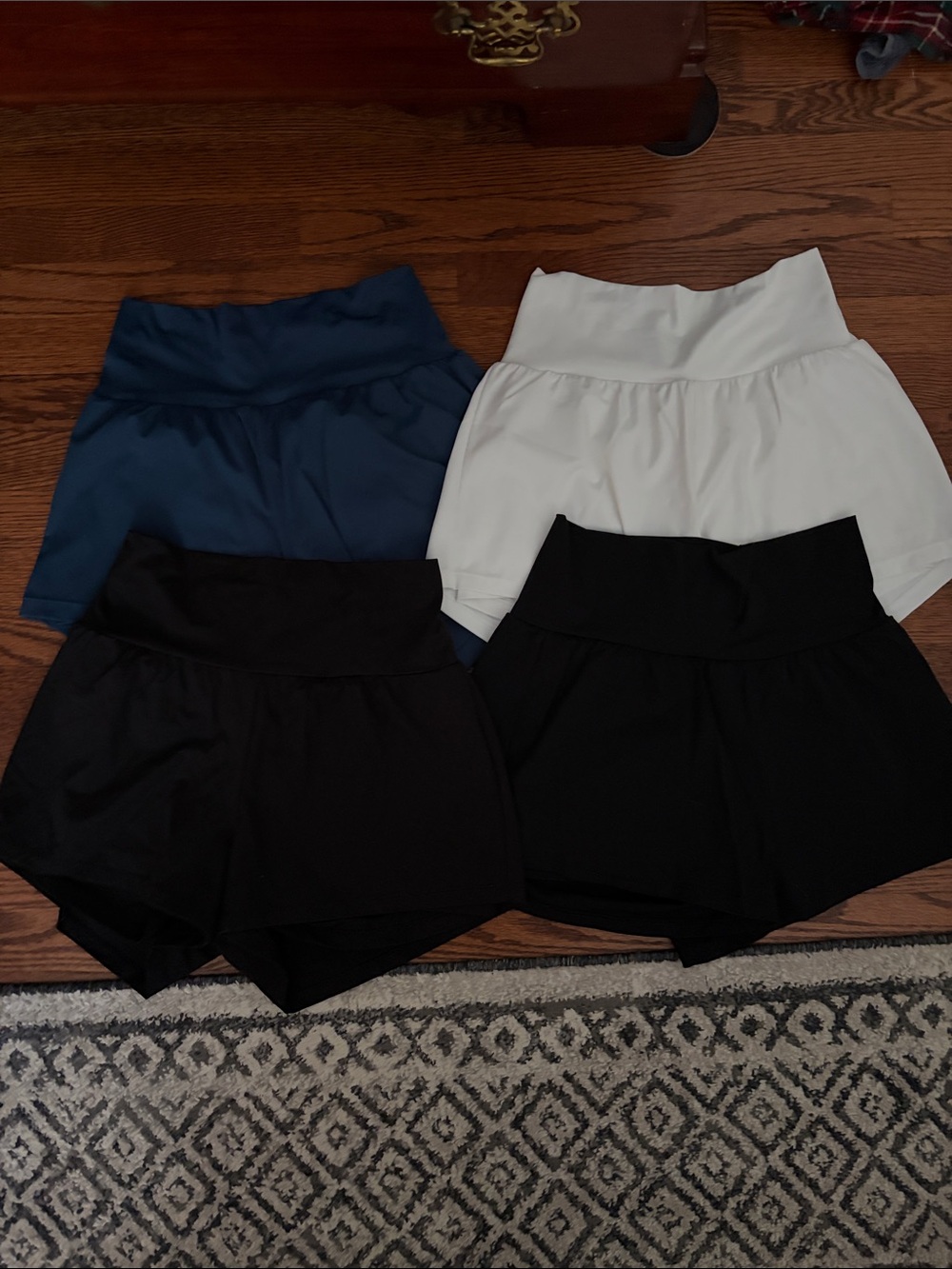 Set of 4 High-Waist Halara Athletic Shorts in Black (2), Blue, White